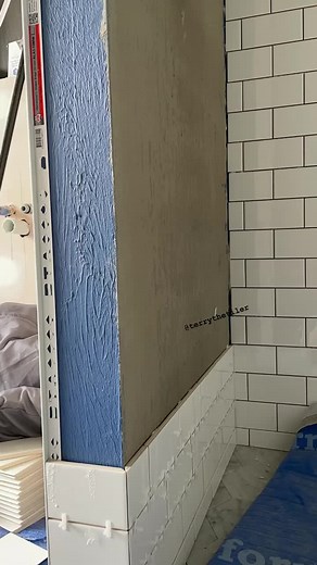 Bathroom Tiling Process: Textured White Tile Installation