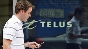 Ottawa rejects telecom merger