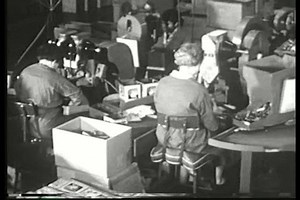 1950s - Assembly line workers make toys in a factory in the 1950s.