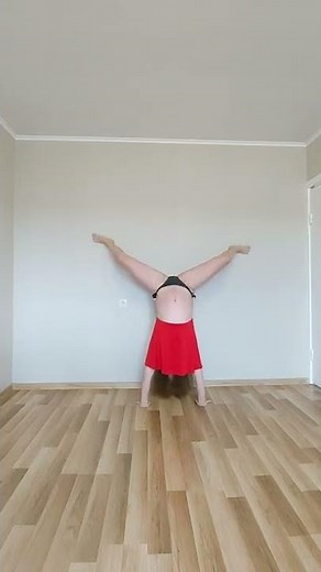 Handstand in dress