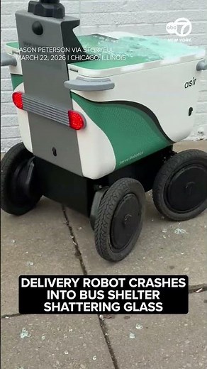Delivery robot crashes into bus shelter shattering glass