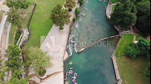 Tubers Floating the Comal River Tube Chute in New Braunfels, Texas