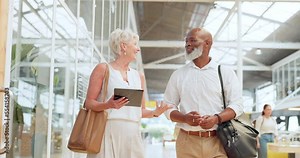 Advice, planning and business people networking with a tablet, consulting strategy and proposal communication. Conversation, project and elderly employees walking in office with tech for connection