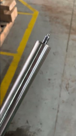 Stainless steel locking gas spring with safetyt shroud
