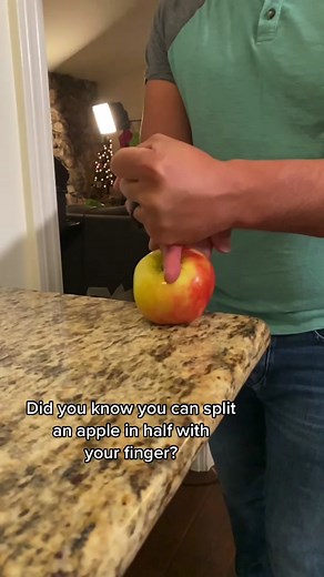 Unleash your super strength #superpower by splitting an apple in half with your finger! #hack #lifehack #howto #holdup #nobigdeal