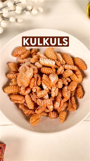 Embrace the festive magic with our Kulkuls recipe video – a delightful Goan Christmas sweet that promises to fill your home with the warmth of tradition and the sweetness of the season! 🎄 Ingredients: For the Dough: 2 cups all-purpose flour 1/2 cup semolina (sooji) 1/2 cup coconut milk 1/2 cup powdered sugar 1/4 cup ghee (clarified butter) A pinch of salt Oil for deep frying For Sugar Syrup: 1/2 cup sugar 1/4 cup water #kulkuls #christmassweets #traditionalsweets #goancuisine #goa #sweetsfromgo