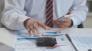 Business Documents, Auditor businesswoman checking searching document legal prepare paperwork or report for analysis TAX time,accountant Documents data contract partner deal in workplace office