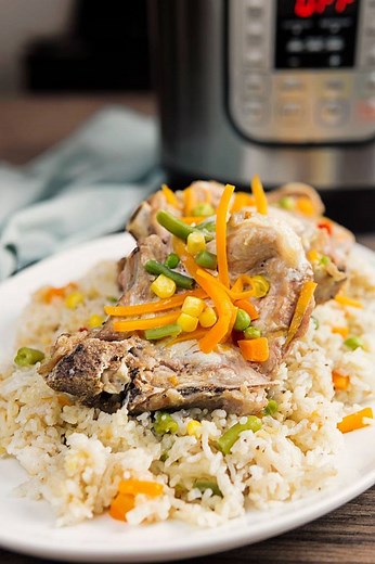Have you ever tried pork chops in your Instant Pot? For the days you're tired and hurried, here's a 30-minute Instant Pot Pork Chops and Rice and Vegetables recipe that requires almost no effort. Tender pork chops, comforting soft rice, and veggies your kids might eat. https://twosleevers.com/instant-pot-pork-chops-rice-with-vegetables | Twosleevers Recipes