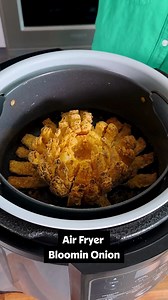 Put that air fryer to good use and make a Bloomin' Onion! 🧅 Get the full recipe in the comments section of this video. | Allrecipes