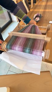 Winding the warp onto the back beam of the rigid heddle loom. We now have a video tutorial on our TabbyandTweed YouTube channel for those looking for some support to warp their rigid heddle loom. Our weaving kits are available in our TabbyandTweed website shop for delivery within the UK, Canada and the USA. Delivery elsewhere is via our TabbyandTweed Etsy shop. #weavingloom #rigidheddleweaving #rigidheddleloom | TabbyandTweed