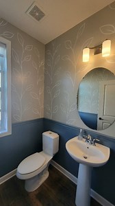 This hand painted mural and chair rail was fun! Love this look!😍 @behrpaint Adirondack Blue Behr Amazing Gray SW Shoji White SW All mixed into Behr Marquee paint for the win! #bathroommakeover #bathroombeforeafter #bathroompainting #bathroommolding #beforeafterhome #beforeandafter #twincitiespainter #twincitiesartist #twincitiescontractors | Brushstrokes & Timber