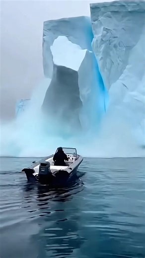 A Boat Drifted Too Close to an Iceberg — Then It Started Cracking