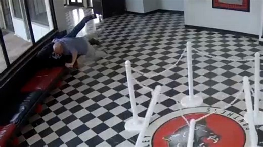 Moment hero principal disarms student threatening to shoot up school
