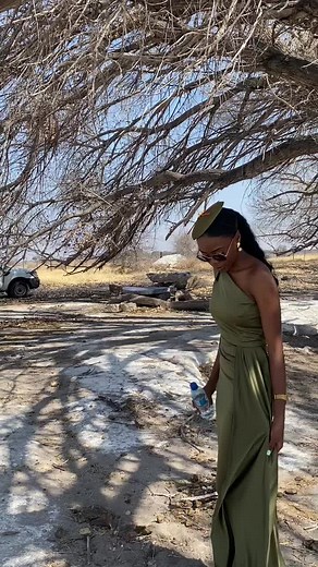 Elegant Green Dress Highlights Outdoor Social Event