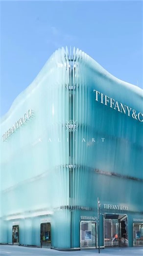 KALI ART GLASS LAB on Instagram: "KALIART Reinvents Tiffany‘s Diamond Language with Light 💎 Kaliart crafted a flowing light and shadow facade of fused glass for Tiffany & Co.’s flagship store in Beijing’s Sanlitun. This project merges ancient glass craftsmanship with contemporary design, achieving three core breakthroughs: Brand Alignment: The glass texture replicates the light play of diamond facets, echoing Tiffany’s luxury essence and dedication to craftsmanship. Technical Excellence: A ±2°C