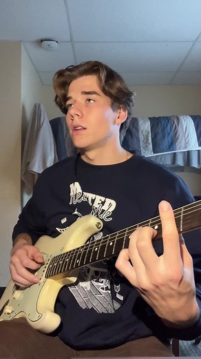 Electric Guitar Performance in a Cozy Room