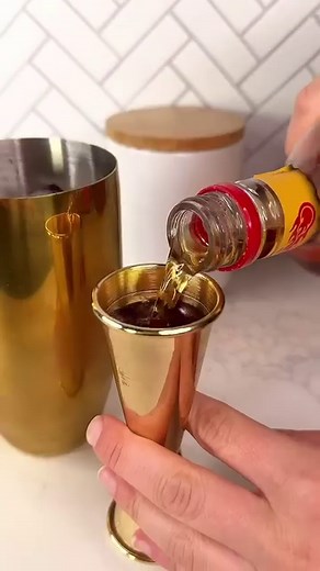 A cocktail so hypnotizing it’s dangerous ✨ Poison Apple Cocktail is what we like to call temptation in a glass. Make it yourself using the link in bio. 🎥 @thegarnishedpalate @itsashrev | Delish
