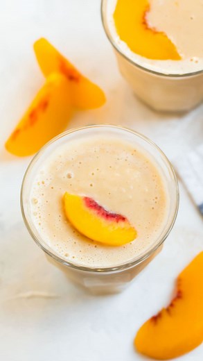 This creamy, protein-rich Peach Smoothie has a little cinnamon and ginger, so it tastes like peach pie! Get the recipe at the link in my @wellplated bio or find it here: https://www.wellplated.com/peach-smoothie/ #wellplatedrecipes #peachrecipes #peaches #peaches🍑 #smoothies #smoothierecipe #healthybreakfastideas #healthysnackideas #healthysnack #highprotein | Well Plated
