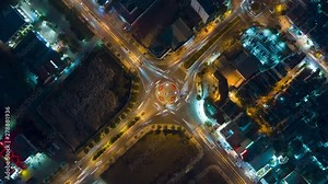Timelapse of Heavy Rush Hour Traffic on 4 way Roundabout Intersection in Vietnam - Aerial Hyperlapse