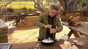 1.3K views · 26 reactions | Watch Steven Raichlen as he cooks breakfast on the Memphis Wood Fire Grill. This grilled egg recipe is from Steven's Project Fire cookbook and is simple and extremely tasty! Creamy eggs, crusty bread crumbs, salty prosciutto, and parmesan come together to create the ultimate breakfast skillet. | Memphis Wood Fire Grills | Facebook