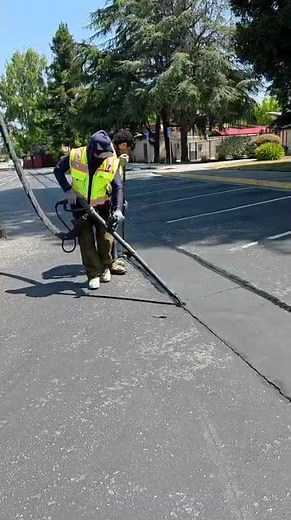 Crack filling with Crafco SS125 using Hot Rubberized material