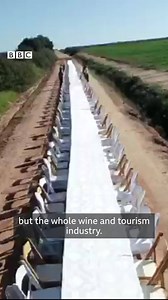 This very long 200m empty table is part of a protest in South Africa against the country's alcohol ban and resulting job losses🍷 The government says the ban will take pressure off the healthcare system as it deals with the Covid-19 crisis: https://bbc.in/2EdGu0P | BBC World Service