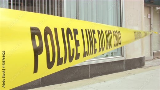 caution sign police line yelow tape do not cross criminal location.