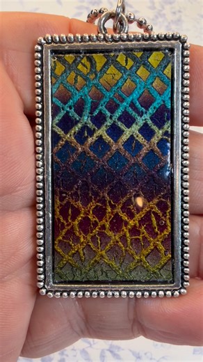 Handmade Metallic Polymer Clay and Resin Pendant - Silver Bezel Setting - Multicolored Abstract Design #HandmadeJewelry #Polymerclay #ResinJewelry #Metallic #AbstractArt | Jenn Ross Designs