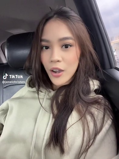 Urban Reflections: A Moment in the Car