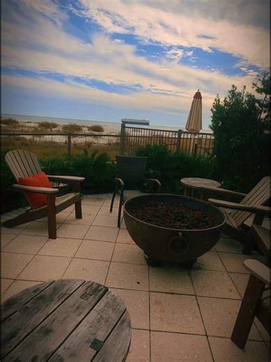 Standing by the fire, watching a massive ship move quietly across the ocean — a reminder that life keeps moving, even when you finally slow down. #OceanView #BeachVibes #CoastalLife #IslandLife #TravelTikTok4