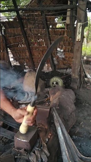the process of installing the handle on the lawn mower