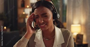 Headache, burnout and exhausted Indian woman in call center overwhelmed by workload in office or night shift. Frustrated, overworked and tired agent with deadline anxiety, sales pressure and stress