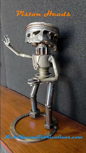 Scrap metal art by NicksKustomFabrications.com Piston Heads Sculpture #120