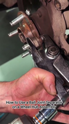 How to Use a Ball Joint Separator on a Wheel Hub Assembly