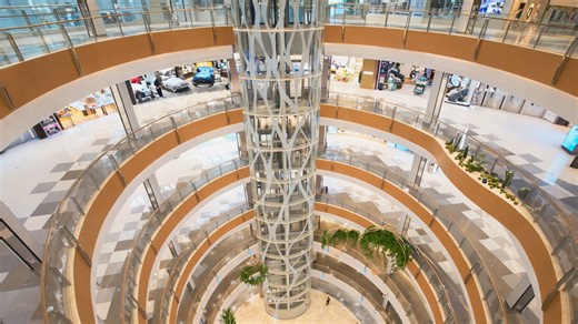 China mall includes a central glass tower connecting every floor level