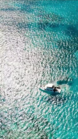 Exploring Belize from Above: The Great Blue Hole Unveiled by Drone.