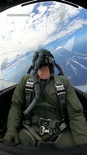 Fighter aircraft canopy explodes in midair, exposing the pilot to violent winds
