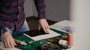 The process of manufacturing a leather wallet handmade. The wizard makes a mark on the leather bark. Own business. Handmade.