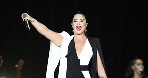 Demi Lovato Wishes Her Fans a Merry Christmas While Decorating Gingerbread House