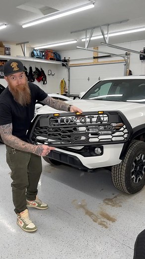 First Mod to our Gen 3 Tacoma Overland build•Putting on the Yotaverse V2 Grille•This comes with the cover for the sensor upfront and camera. Cool that Toyota hides their sensor behind the emblem•It’s a pretty straight forward swap, the only sketchy part is popping out the grille and trim for the first time, but nothing broke so I’m more then happy•Hooked up the Raptor type lights so they turn on with ignition GEARWRENCH Tools EVA foam tray keeping everything organized.That little light is the Ol