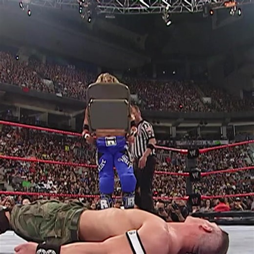 ‏John Cena battles Edge in an epic TLC Match_