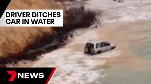 Driver abandons car after getting stuck in surf at Rainbow Beach