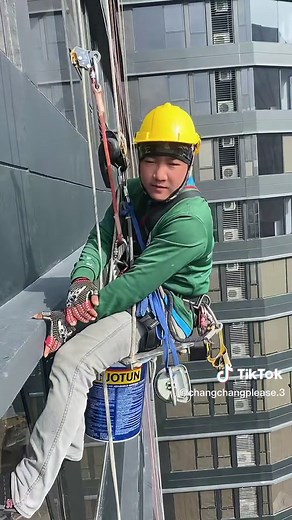 High-Rise Window Cleaning with Safety Measures