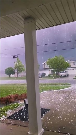 Oh my god... lightning flashed continuously while heavy rain and hail fell in suburban Texas.