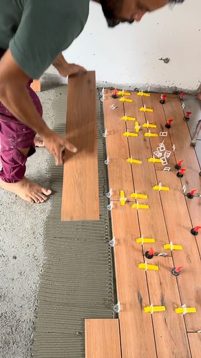 “Perfect finishing starts from perfect fixing ✨ | Wooden strip tile work in progress 🪵🧱”#WoodenStripTile #TileFixing #InteriorDesign #HomeDecor #FlooringDesign #WoodFinish #TileWork #ConstructionLife #MasonWork #InteriorMakeover #RenovationIdeas #Craftsmanship #ModernInteriors #TileInstallation #KeralaInteriors #homerenovation | sparkle flooring solutions
