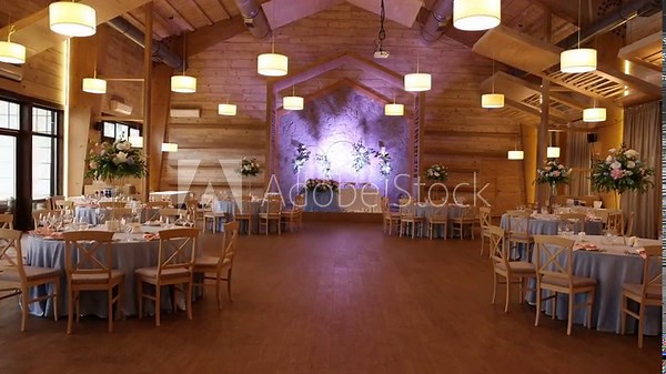 a beautiful wedding table with decor of flowers food and drinks for an banquet in the restaurant