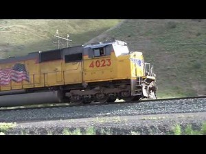 Short 20 Car Union Pacific Passing Along a Utah Country Road