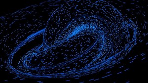 Abstract colorful particles creating transforming galaxy in outer space. Design. Tiny dots flying in a spiral isolated on a black background.