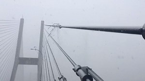 Cable collar drop on the Alex Fraser Bridge, to clear minor snow accumulation this morning. Travellers can expect delays during the afternoon peak travel period, at the Alex Fraser and Port Mann bridges, due to lane closures for winter maintenance activities. Earlier today, rope-access technicians and traffic control were at both bridges to clear the stays. Additional control operations may be required throughout the rest of the day. Ministry staff continue to patrol and closely monitor the weat