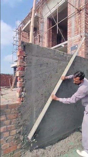 Smoothing process of brick wall cement surface